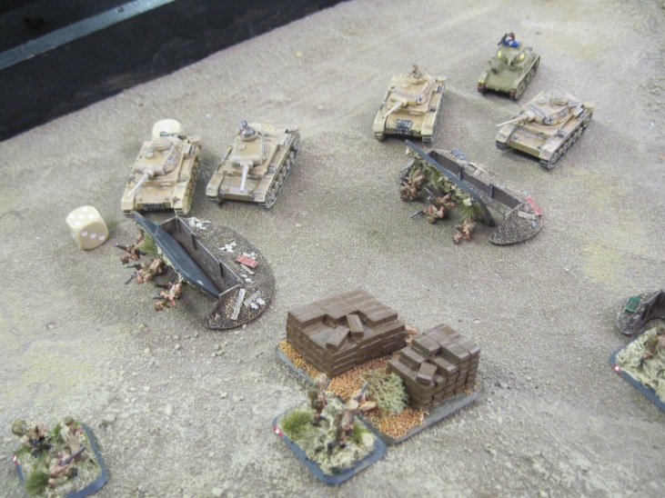 The German tanks roll into the British infantry.